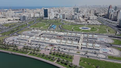 drone view of sharjah central souq, gold souq and city skyline on a bright summer day, united arab emirates