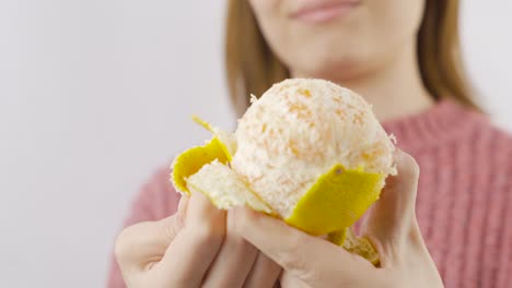 close-up of peeling tangerines.