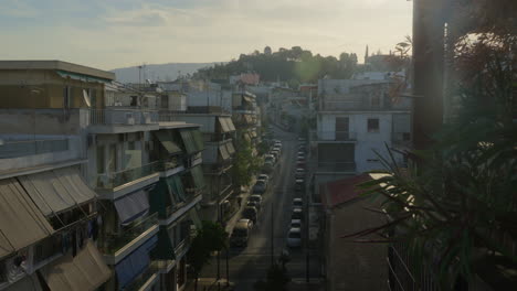 dawn light bathes a peaceful greek city street