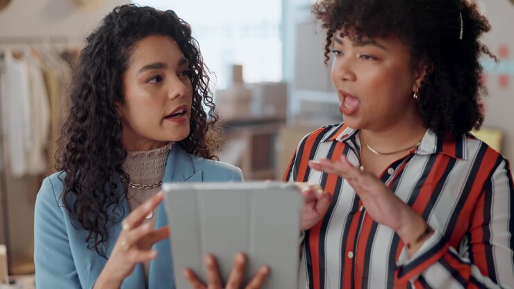 Fashion, designer and women on tablet