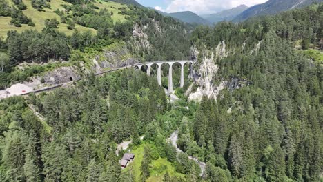aerial view of a stunning railway viaduct in the swiss alps