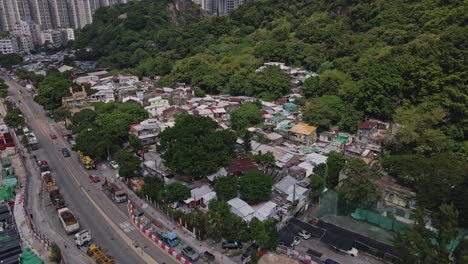 Disparo-Giratorio-De-Un-Dron-Aéreo-Sobre-El-Pueblo-De-Cha-Kwo-Ling,-Hong-Kong,-China