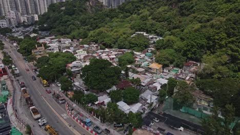 aerial drone rotating shot over cha kwo ling village, hong kong, china