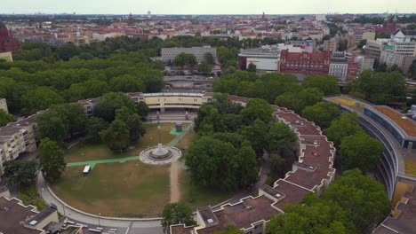 beautiful aerial top view flight ghetto building mehringplatz place city berlin steglitz, germany summer day 2023