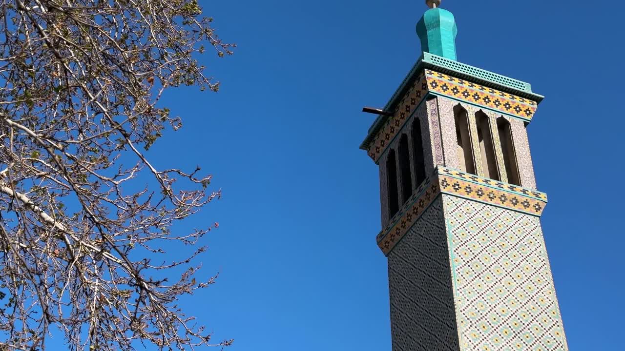 Persian blue tile design of islamic minaret with traditional architecture Golestan Palace Qajar mansion historic landmark ancient fortress Middle East Tehran Iran culture tourism outdoors travel guide