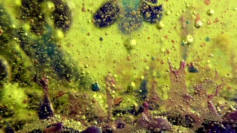 water oil bubbles  behind glass background