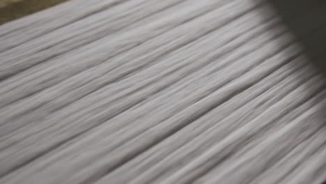 Macro-Shot-Of-Spinning-Machine-Producing-Yarn-Thread-From-Cotton