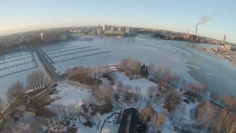 drone shot looking down over a park in finland
