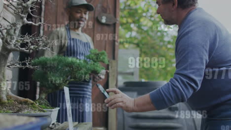 animation of data processing over diverse male colleagues using smartphone at plant nursery