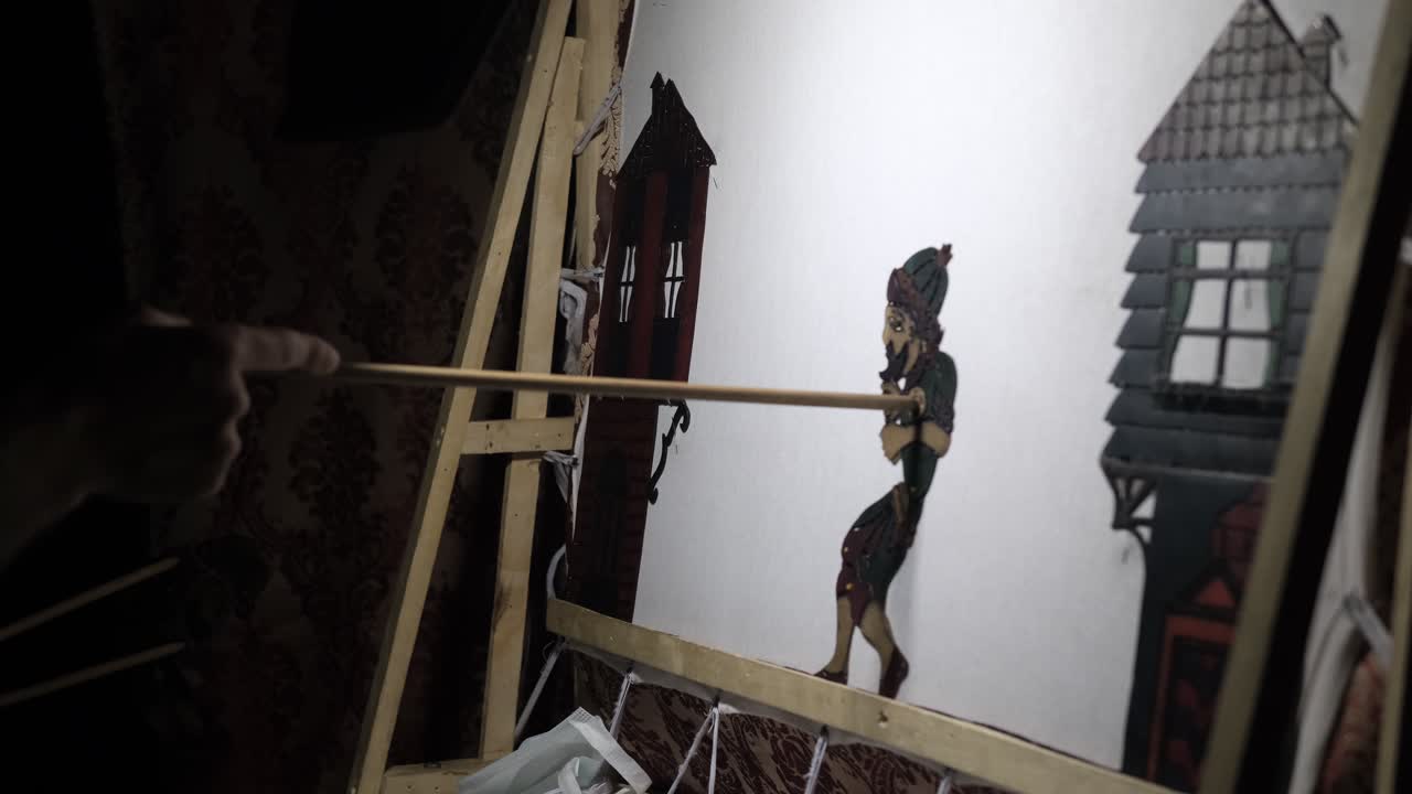 juego de sombras tradicional detrás de la cortina