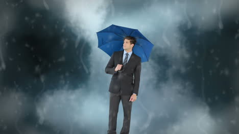 zakenman met zijn paraplu onder de storm