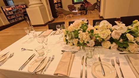 beautifully arranged table with floral centerpiece