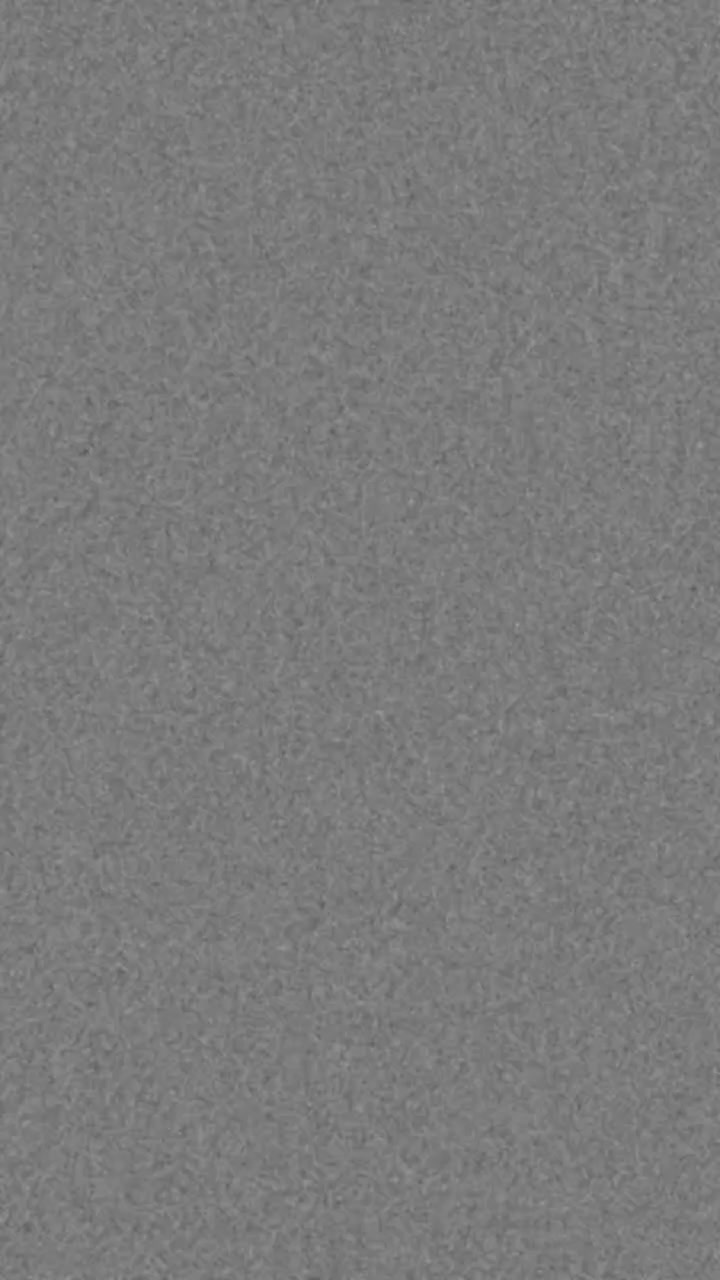 Pystykuva: klassinen 8 mm:n filmirae naarmuilla ja kohinalla retro-kotivideovaikutelmaa varten, saumaton silmukka.