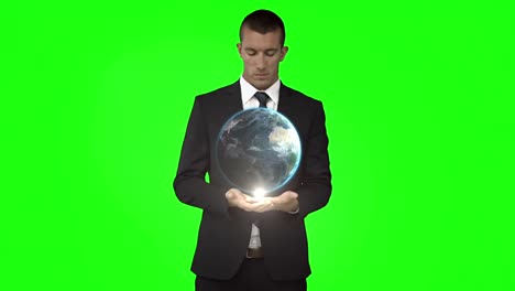 Businessman-with-globe-animation-in-front-of-green-screen