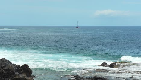 Lonely-boat-near-coastline-of-Tenerife,-static-view