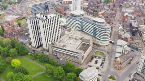 beautiful aerial shot flying over nottingham city and buildings in england