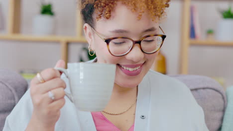 Black-woman,-reading-and-drinking-coffee