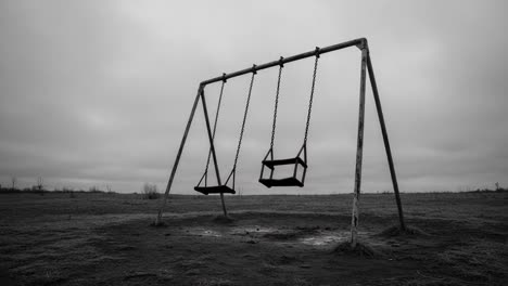 a lonely swing set in an abandoned playground: capturing the essence of nostalgia and isolation amidst a gray atmosphere