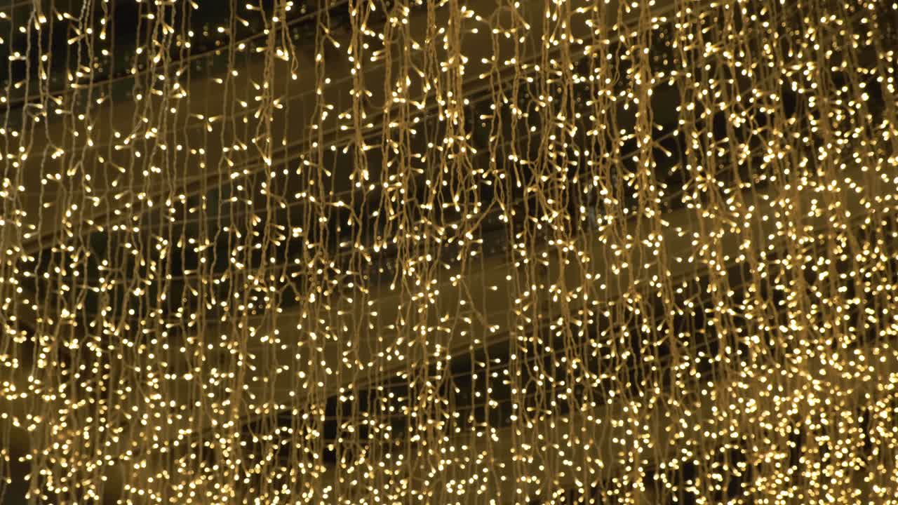 Racking focus of romantic dreamy golden bokeh light background
