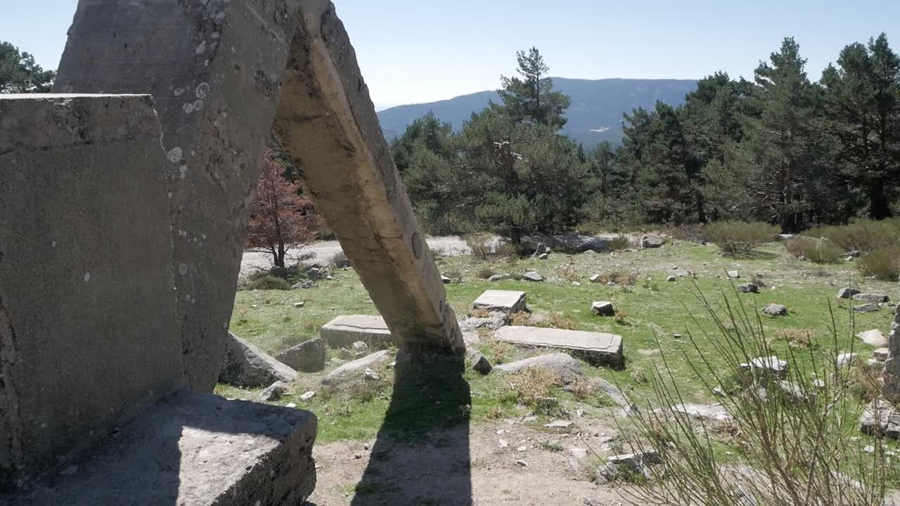 Concrete monument in the mountains near Madrid under clear blue sky in spring