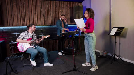 musical group in the studio