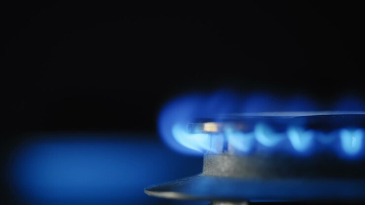 Bright Gas Flame Burning In Kitchen Stove At Night Slow Motion