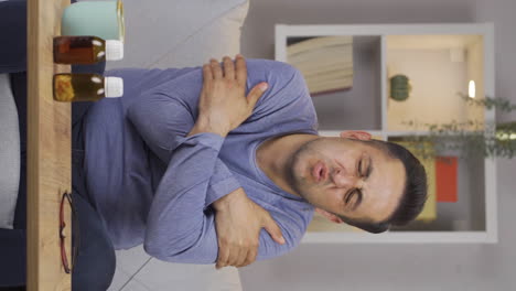 Vertical-video-of-Sick-man-whose-bones-hurt-when-he-sneezes.