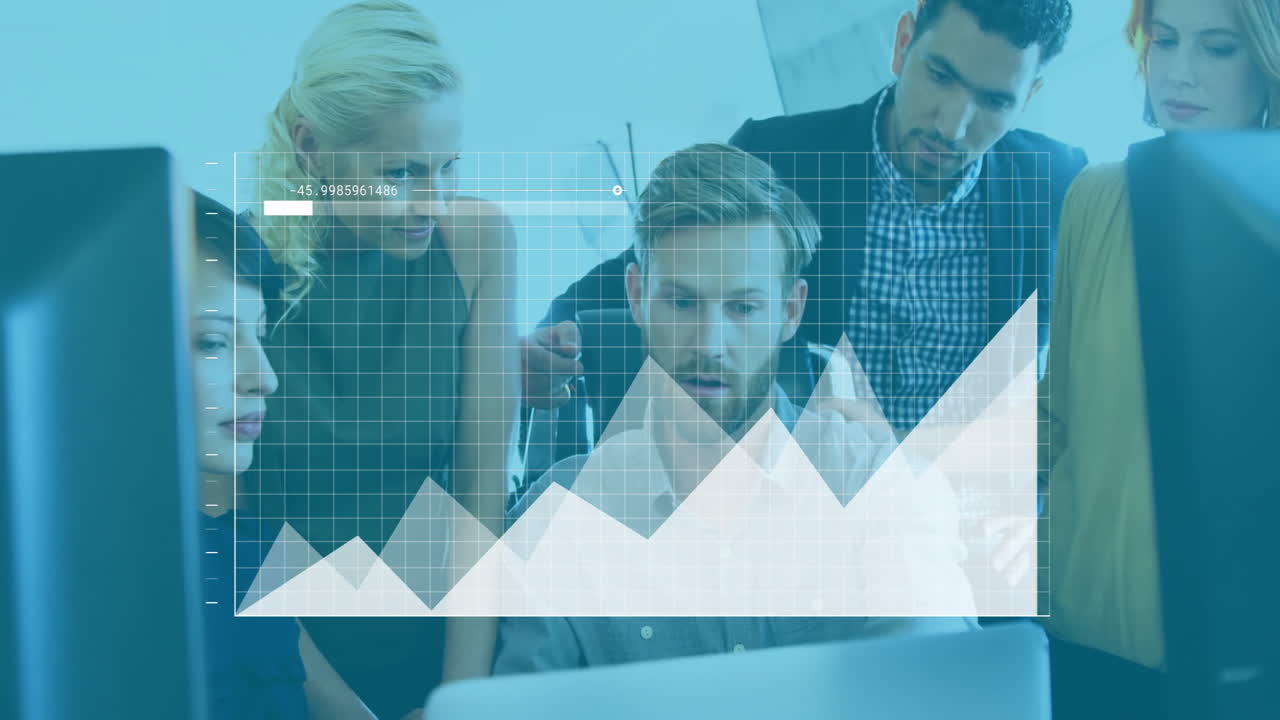 Business team analyzing data with graph animation overlay on computer screen