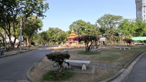timelapse of a serene park with passing vehicles