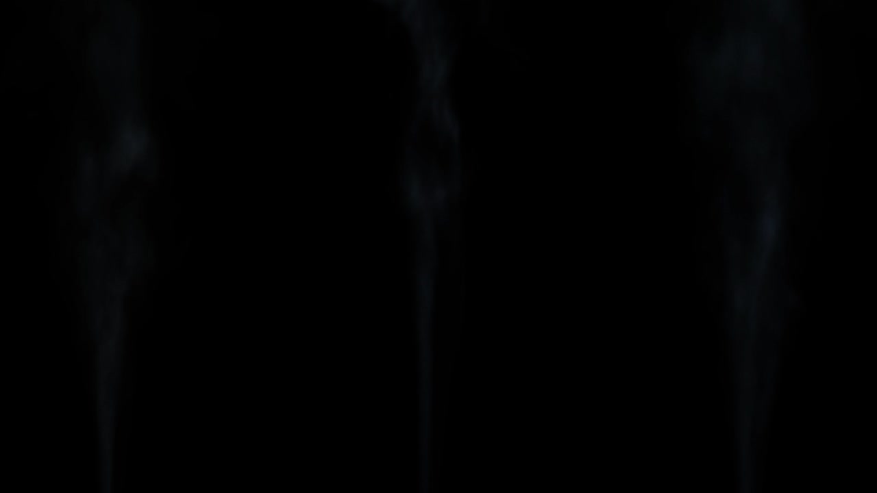 3 swift streams of white smoke rising up against a black