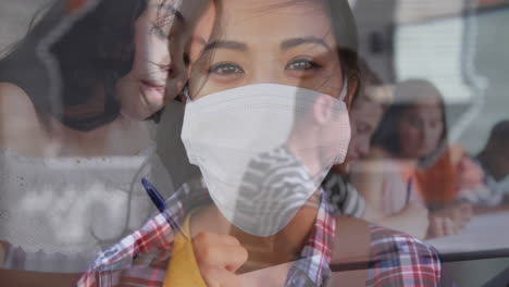 digital composition of asian woman wearing face mask against college student studying at college