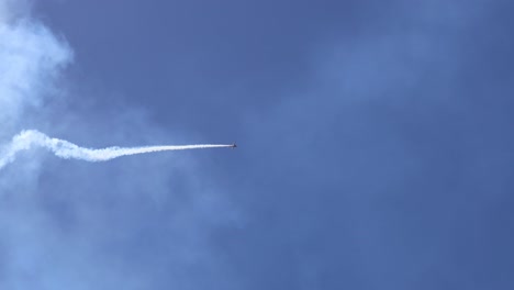 aircraft drawing letters or symbols in the sky