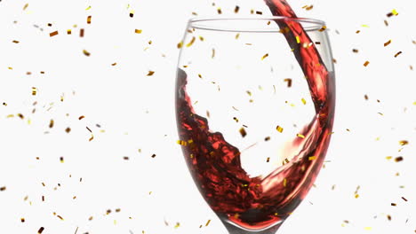 pouring red wine into glass with golden confetti animation floating around