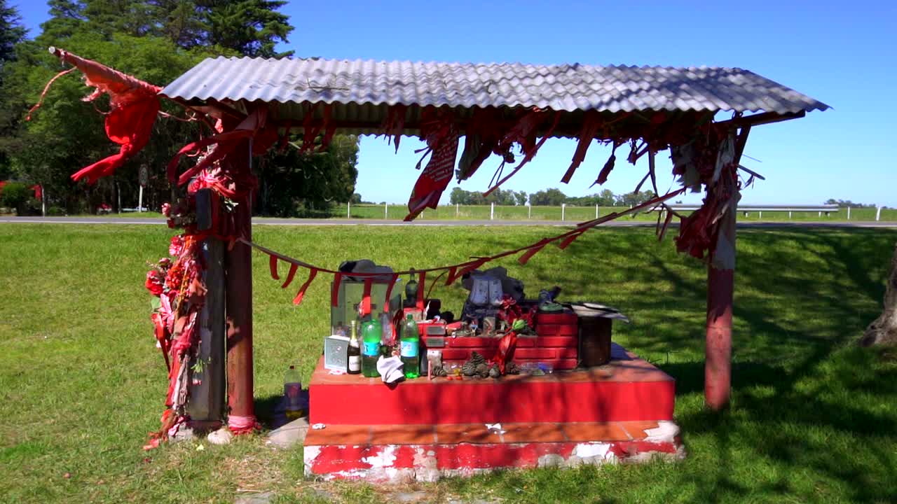 A shrine in honor of Gauchito Gil near a provincial route