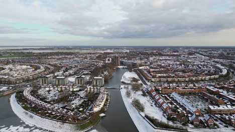 Snow-and-winter-aerial-view-at-Amersfoort-Nieuwland,-The-Netherlands