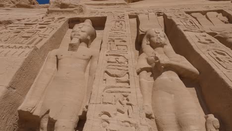 beautiful carved statues and hieroglyphs at abu simbel temples, egypt