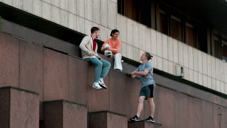 friends sitting on the street