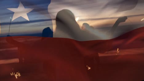 animation of waving of chile flag over group of friends on the beach