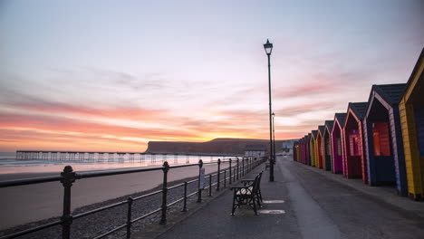 saltburn pier promenade timelapse, dawn to sunrise with lovely sky colouring and beach huts