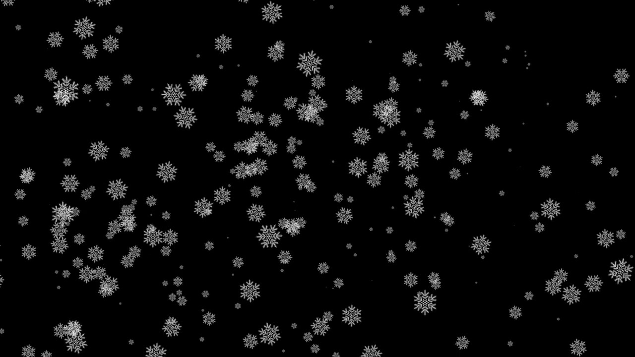 White Snowflakes Falling Against a Black Background