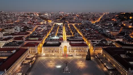 scenic night view of praca do comercio and rua augusta arch in lisbon, portugal