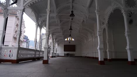 walking in market colonnade, karlovy vary, czech republic