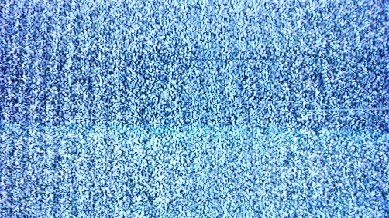 Flickering TV Static Noise and Glitch Effect on Screen