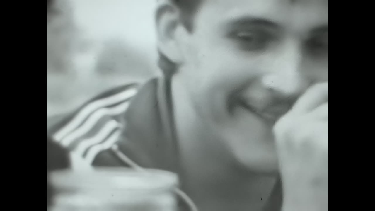 People Sitting Together, A Glimpse Into the Everyday Lives of Soviet People in the USSR. CIRCA USSR 1980s: People, representative of the Soviet people, sitting side by side in a candid moment.