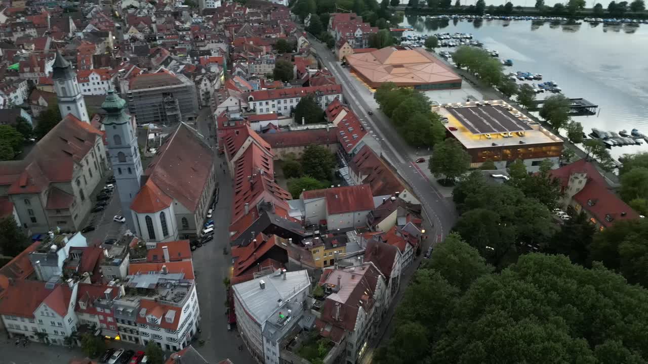 Aerial drone footage showcases the city nestled beside the iconic Lake of Constance, highlighting its picturesque landscape and waterfront charm