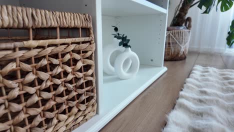 home decor with basket and vase on shelf