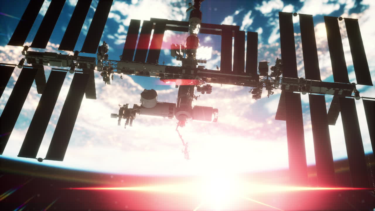 지구와 국제 우주 정거장이 지구 주위를 공전하고 있습니다.