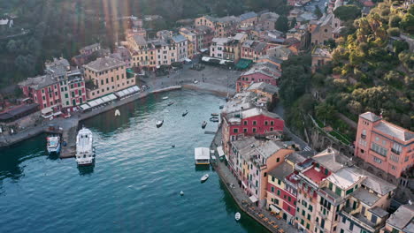 Top-drone-view-of-sun-rays-falling-over-Portofino-touristic-seaside-village