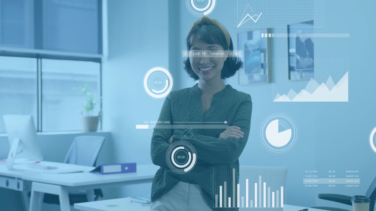 Businesswoman in office with data analytics and graphs animation over workspace