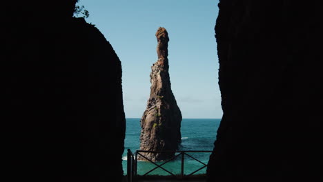 volcanic sea stack at ribeira da janela in madeira island, portugal - tilt up shot